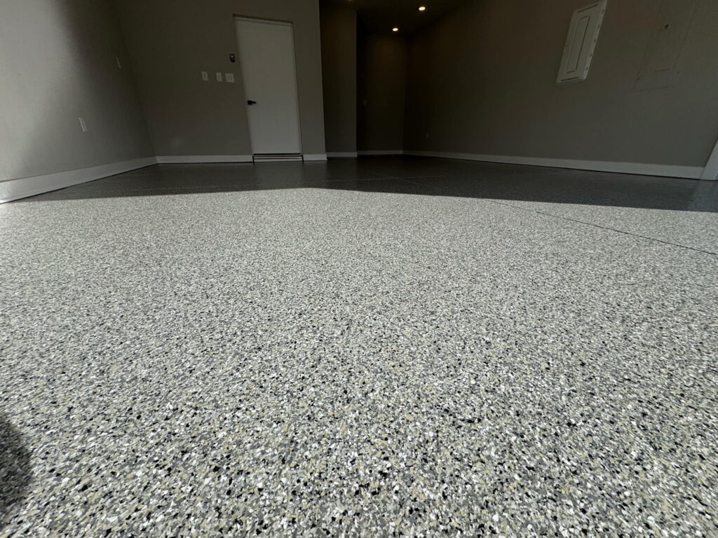 Commercial retail flake epoxy flooring project in Austin, TX