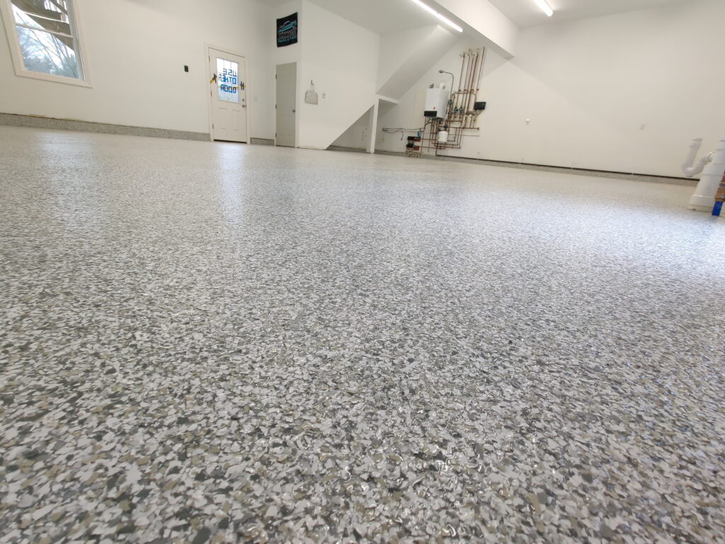 Garage epoxy flooring project with bike storage in San Antonio, TX