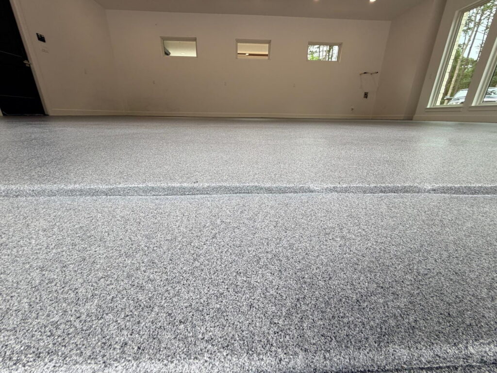 Garage quartz flooring system project in San Antonio, TX