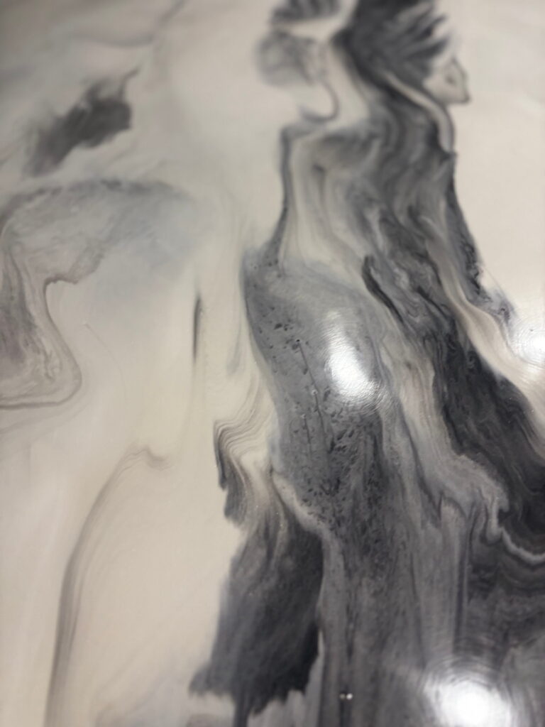 Metallic epoxy flooring swirl project in Austin, TX