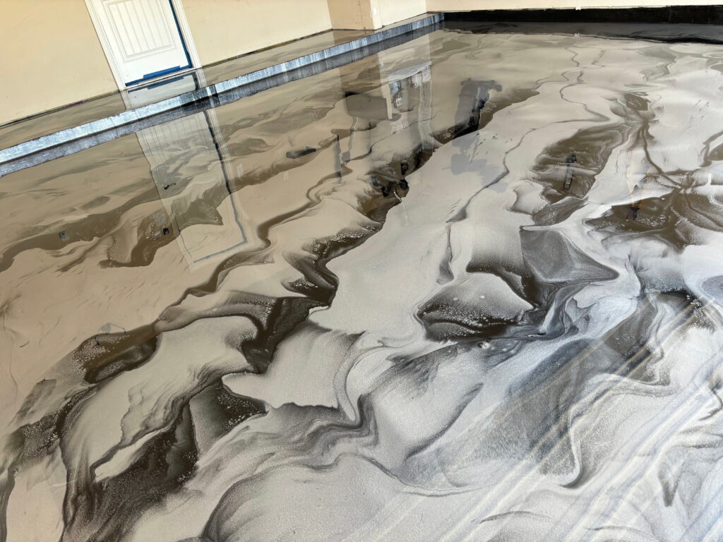 Commercial showroom metallic epoxy flooring project in San Antonio, TX