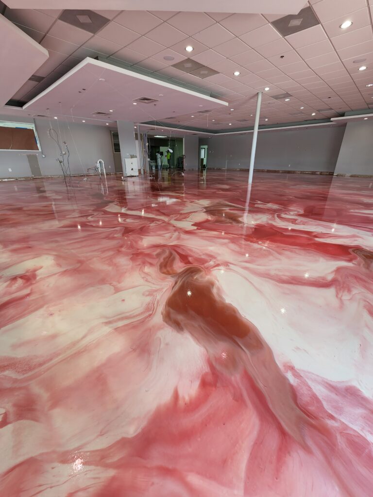 Commercial showroom metallic epoxy flooring project in San Antonio, TX