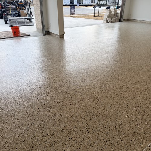 Flake epoxy flooring in a new-build garage in San Antonio, TX